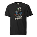 Front view of a black T-shirt with a seated smoking skeleton wearing a green beanie on a skateboard above “Stay Boardin’” lettering.