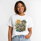 Stay High Mushroom Artwork Graphic t shirt in White worn by a studio model in an upper-body walking pose on a clean white background