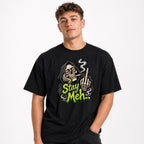 Stay Meh t shirt in Black worn by a studio model in an upper-body front relaxed pose on a clean white background