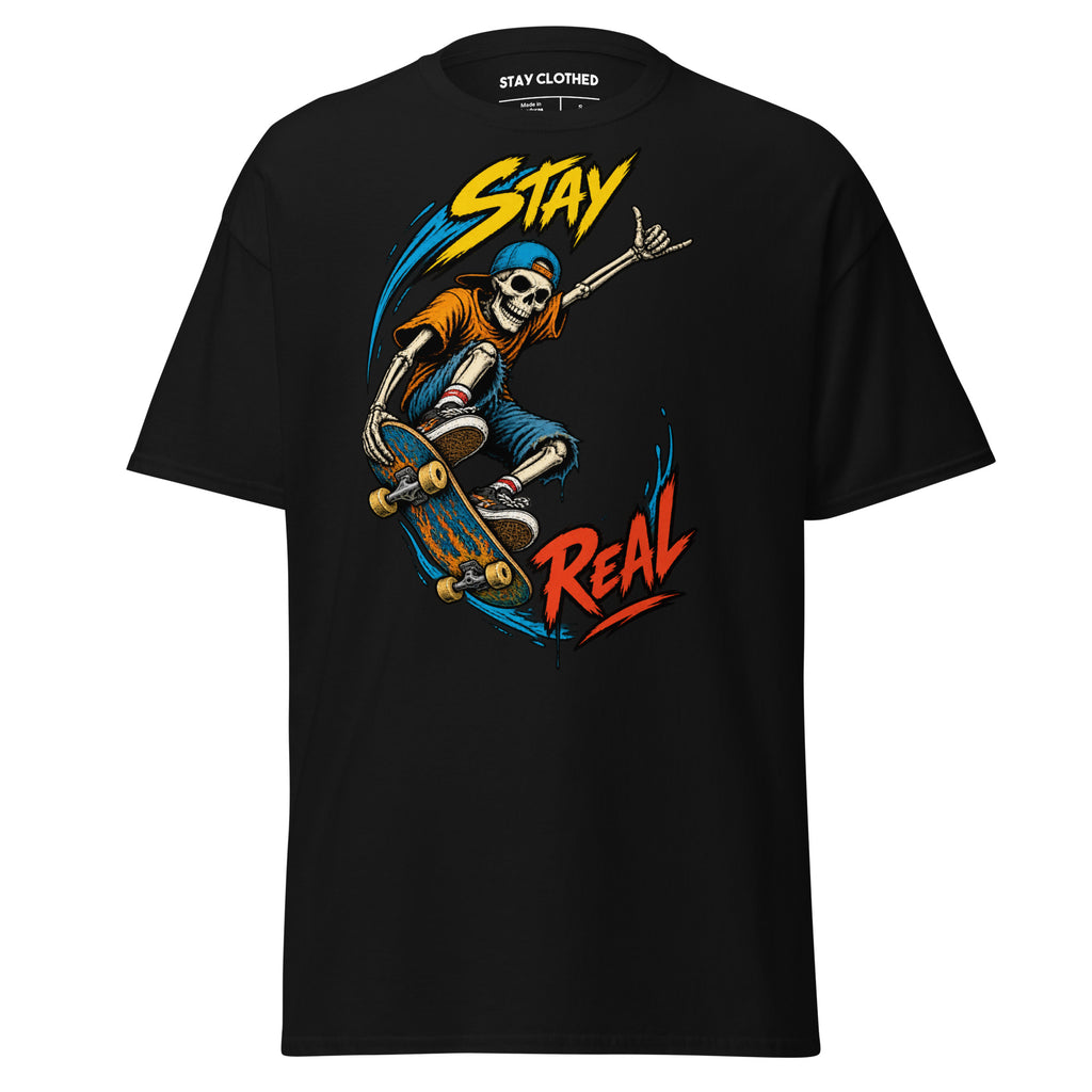 Stay Real graphic showing a skateboarding skeleton with colorful blue, yellow, orange, and red accents on a Black T-shirt.