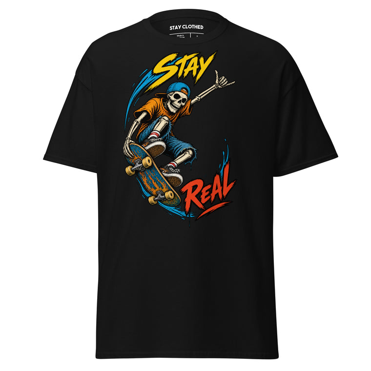 Stay Real graphic showing a skateboarding skeleton with colorful blue, yellow, orange, and red accents on a Black T-shirt.