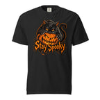 Front view of a Black T-shirt featuring a black cat with bright orange eyes over a grinning orange pumpkin and “Stay Spooky” lettering.