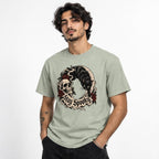 Front view of a Bay T-shirt with a gothic Stay Spooky design featuring a black cat, skull, red roses, crescent moon and smoke-like flourishes.