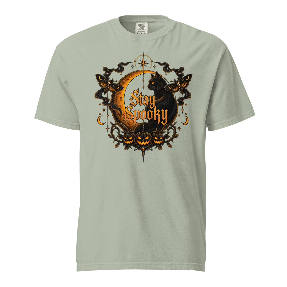 Front view of a Bay T-shirt featuring a black cat, golden crescent moon, carved pumpkins, moths, stars, and “Stay Spooky” lettering.