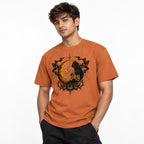 Front view of a Yam T-shirt featuring a black cat, golden crescent moon, pumpkins, and ornate “Stay Spooky” lettering.