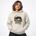 Front view of an Oatmeal Heather hoodie featuring a black cat with amber eyes reclining over a skull beneath a crescent moon.