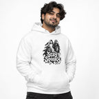 Model wearing a White hoodie with a front graphic of a floating sheet ghost holding a lantern above dripping Stay Spooky lettering.