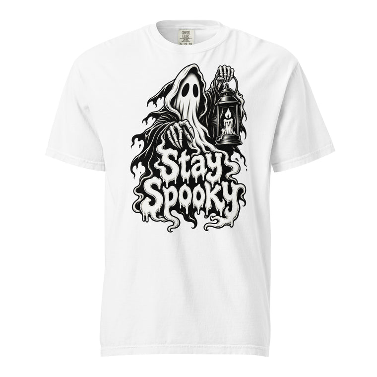 Front view of a white T-shirt featuring a hooded ghost, skeletal hands, a lantern with a candle, and dripping “Stay Spooky” text.