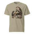 Front view of a Khaki T-Shirt featuring an owl, skull and lantern above a “Stay Spooky” scroll banner.