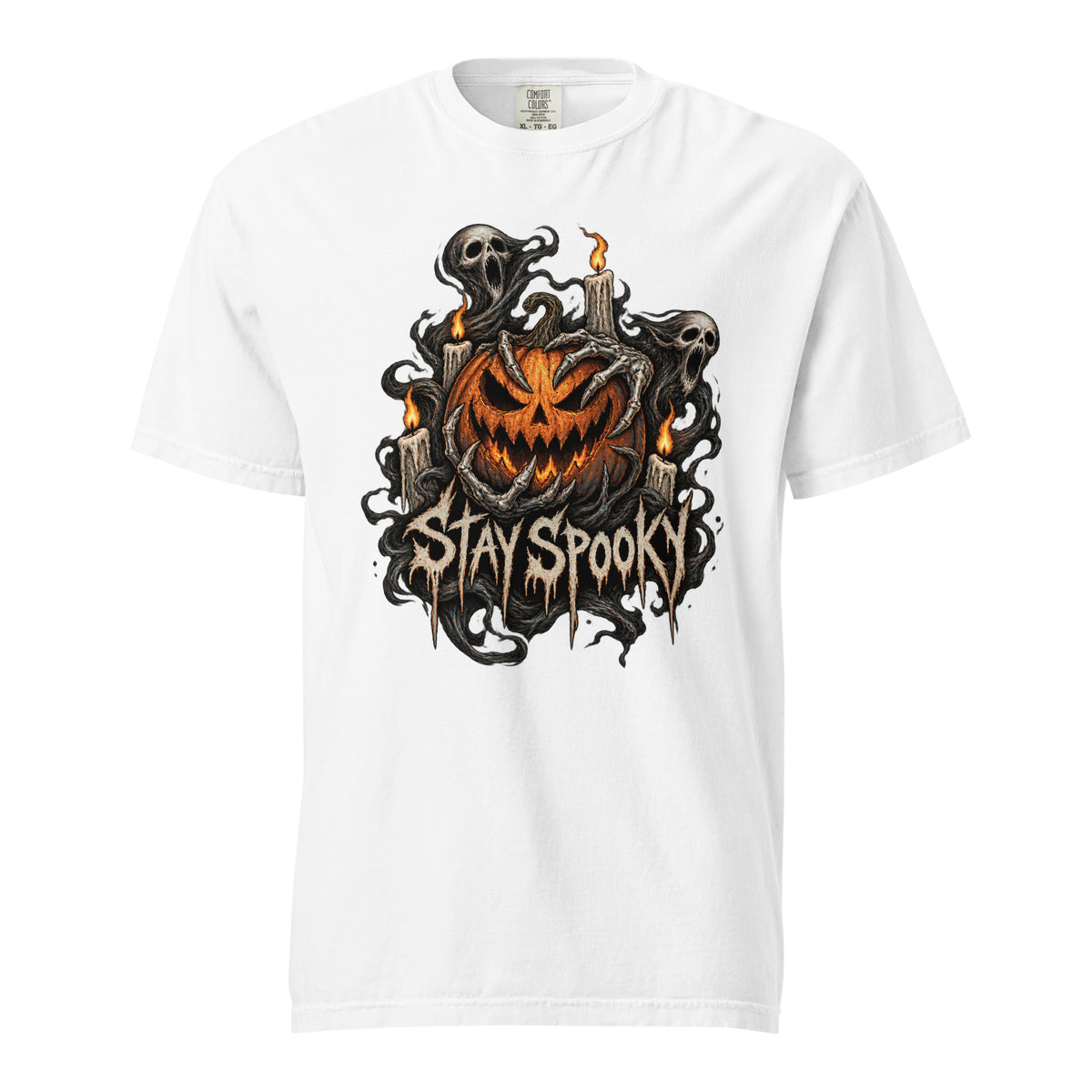 Front view of a white T-shirt featuring a grinning orange pumpkin, skeleton ghosts, candles, and distressed STAY SPOOKY lettering.