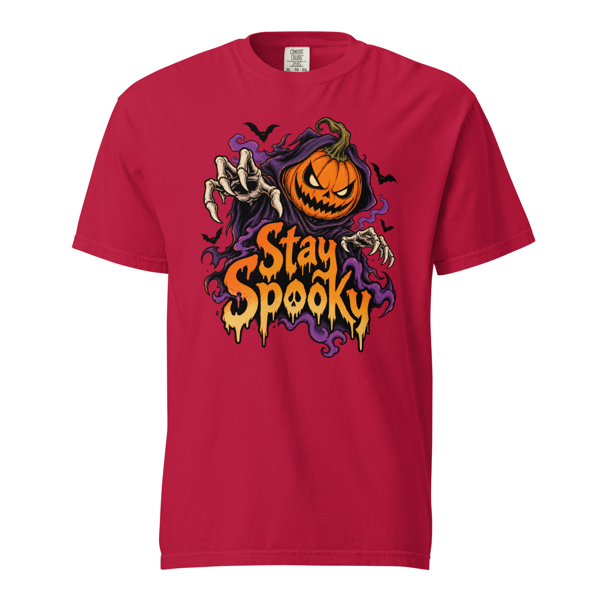 Front view of a Red T-shirt with a gothic Pumpkin, Skeleton hands, and Bats surrounding dripping “Stay Spooky” lettering.