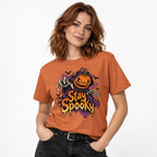 Front view of a Yam T-shirt with a bold Stay Spooky graphic featuring an angry pumpkin, skeletal hands, purple smoke, and black bats.