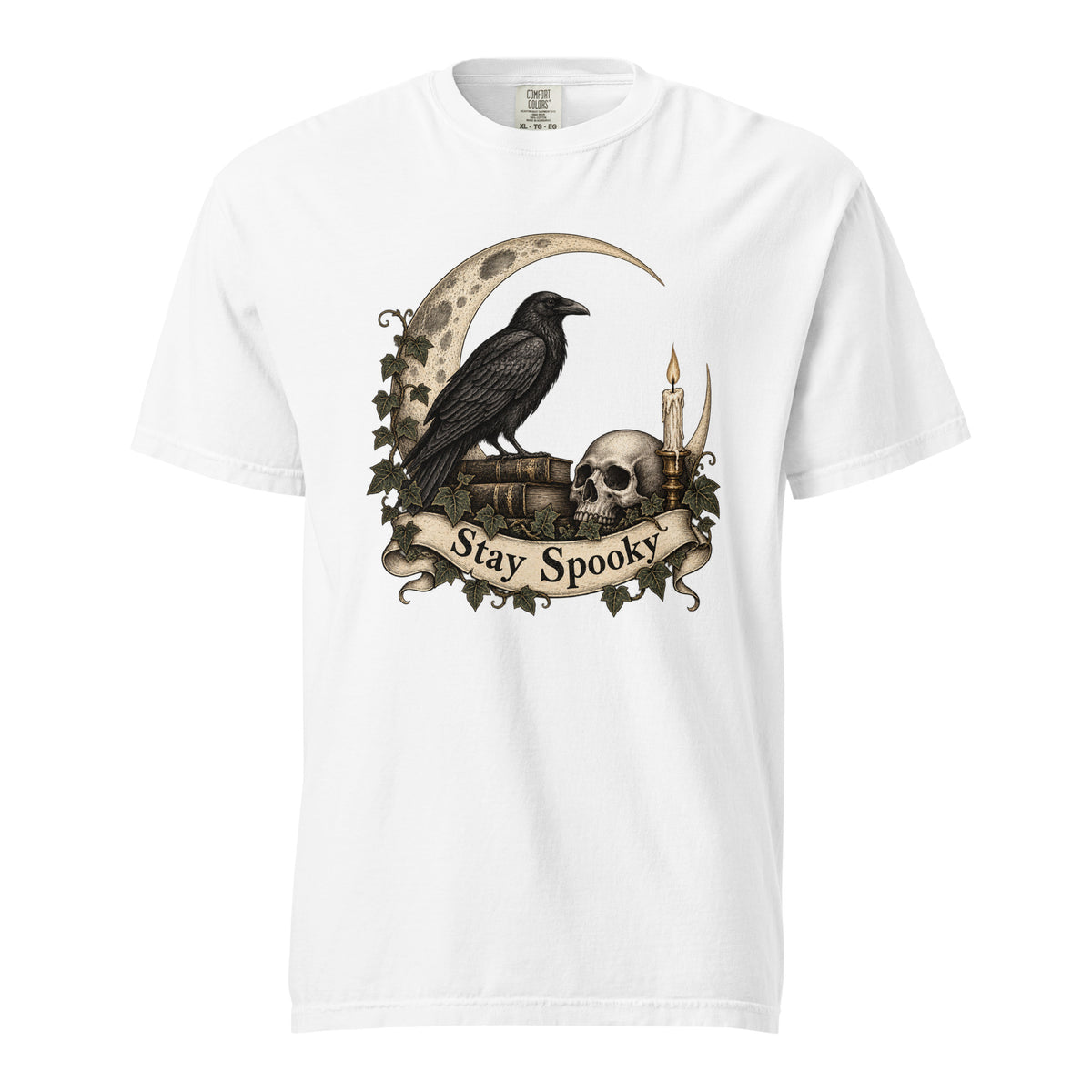 Front view of a white T-shirt featuring a vintage gothic illustration of a raven, skull, crescent moon, candle, ivy and “Stay Spooky” scroll.