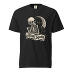Black T-shirt with a monochrome seated skeleton beside a black cat and crescent moon, framed by a distressed “Stay Spooky” banner.