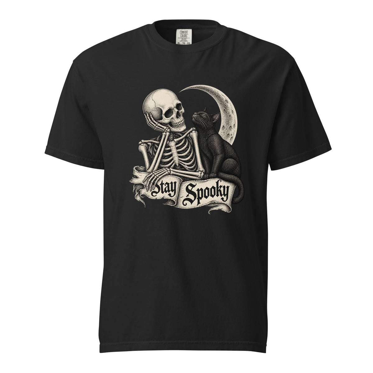 Black T-shirt with a monochrome seated skeleton beside a black cat and crescent moon, framed by a distressed “Stay Spooky” banner.