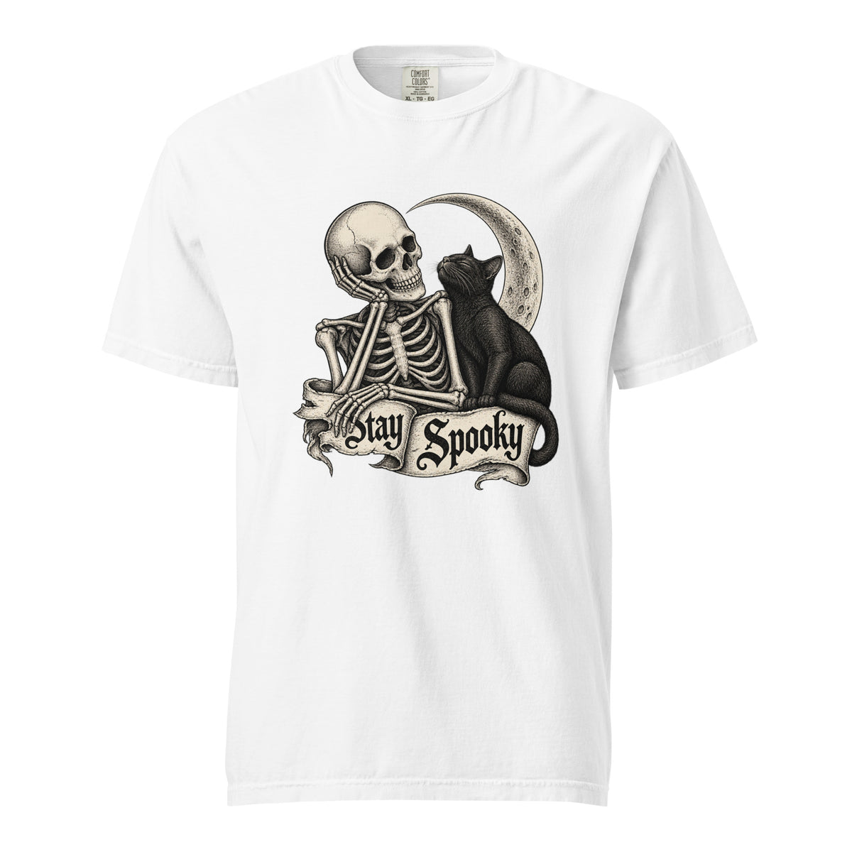 Front view of a white T-shirt featuring a seated skeleton beside a black cat, framed by a crescent moon and Stay Spooky banner.