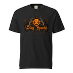 Front view of a black T-shirt with a glowing jack-o'-lantern held by skeletal hands and ornate orange “Stay Spooky” lettering.