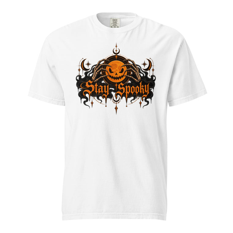 Front view of a white T-shirt with a glowing Jack-O'-Lantern held by Skeleton Hands above ornate orange “Stay Spooky” lettering.