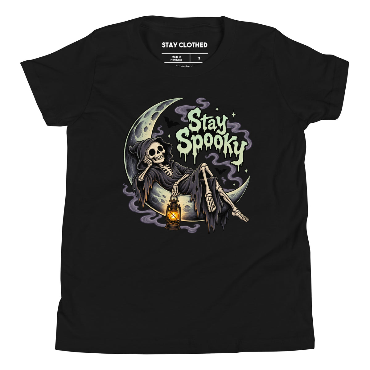 Front view of a black kids T-shirt with a hooded skeleton on a crescent moon holding a glowing lantern beneath Stay Spooky lettering.