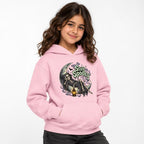 Model wearing a Light Pink hoodie with a front “Stay Spooky” graphic of a skeleton reclining on a crescent moon with a lantern.