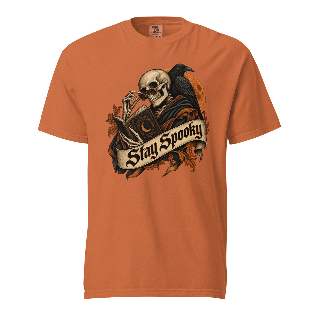 Front view of a Yam T-shirt with a gothic Skull reading an ornate book beside a Raven and orange Moon beneath a Stay Spooky banner.