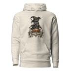 Front view of an Oatmeal Heather hoodie with a black cat in a witch hat perched on an orange pumpkin and Stay Spooky lettering.