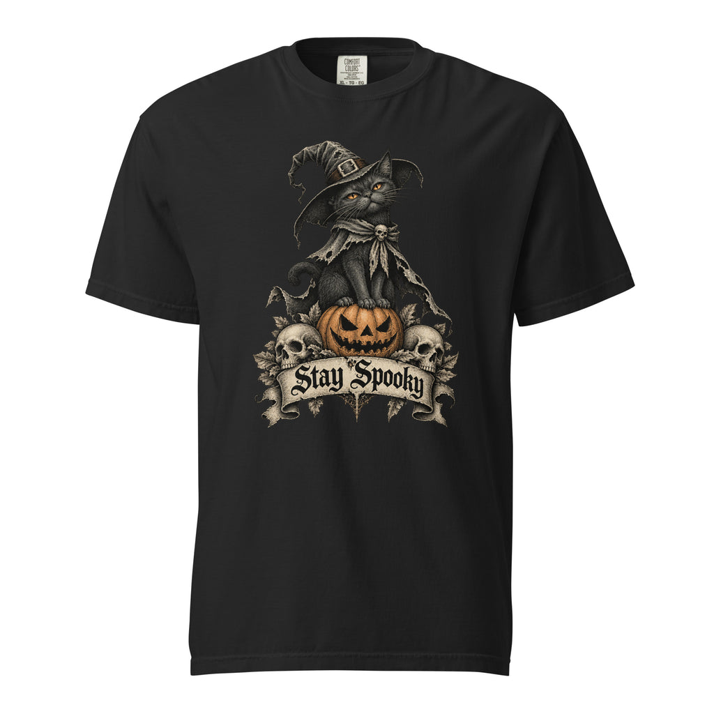 Front view of a Black T-shirt featuring a witch-hat cat on a carved pumpkin, flanked by skulls and a “Stay Spooky” banner.