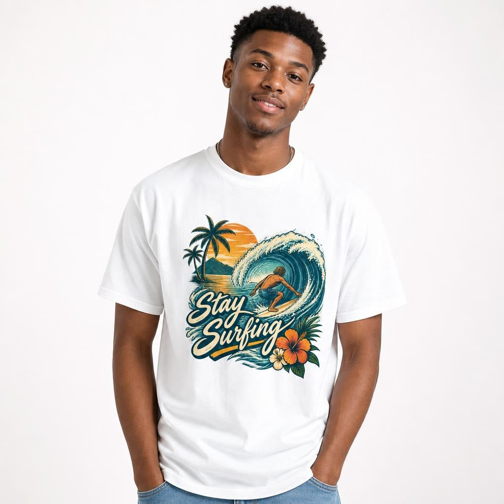 Surfer Riding Wave t shirt in White worn by a studio model in an upper-body front relaxed pose on a clean white background