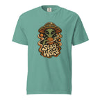 Front view of a seafoam T-shirt with a green alien, flying saucer, orange planet, stars, and readable “Stay Weird” lettering.