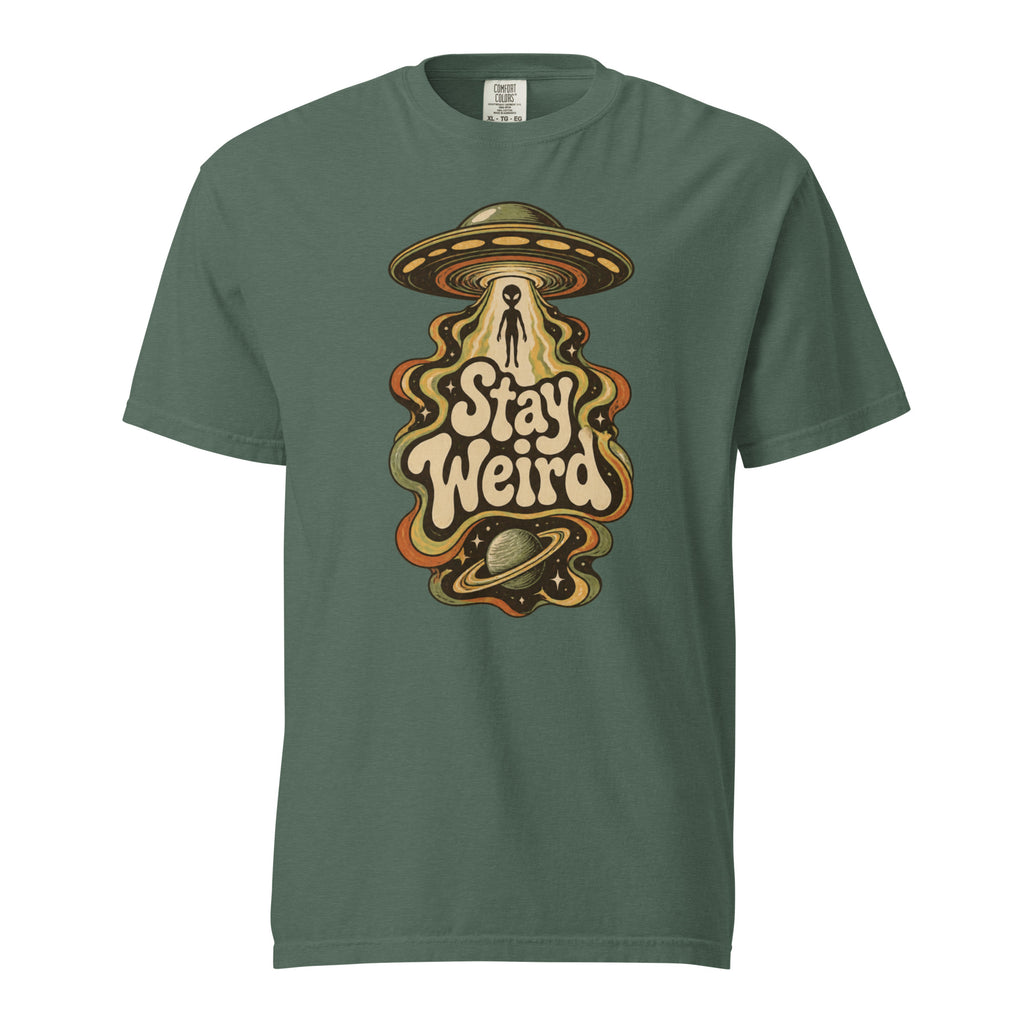 Front view of a Blue Spruce T-shirt featuring a retro Alien beneath a UFO, ringed planet, stars, and “Stay Weird” lettering.