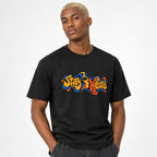 Eye t shirt in Black worn by a studio model in an upper-body side pose on a clean white background