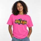 Eye t shirt in Neon Pink worn by a studio model in an upper-body hands in pockets pose on a clean white background