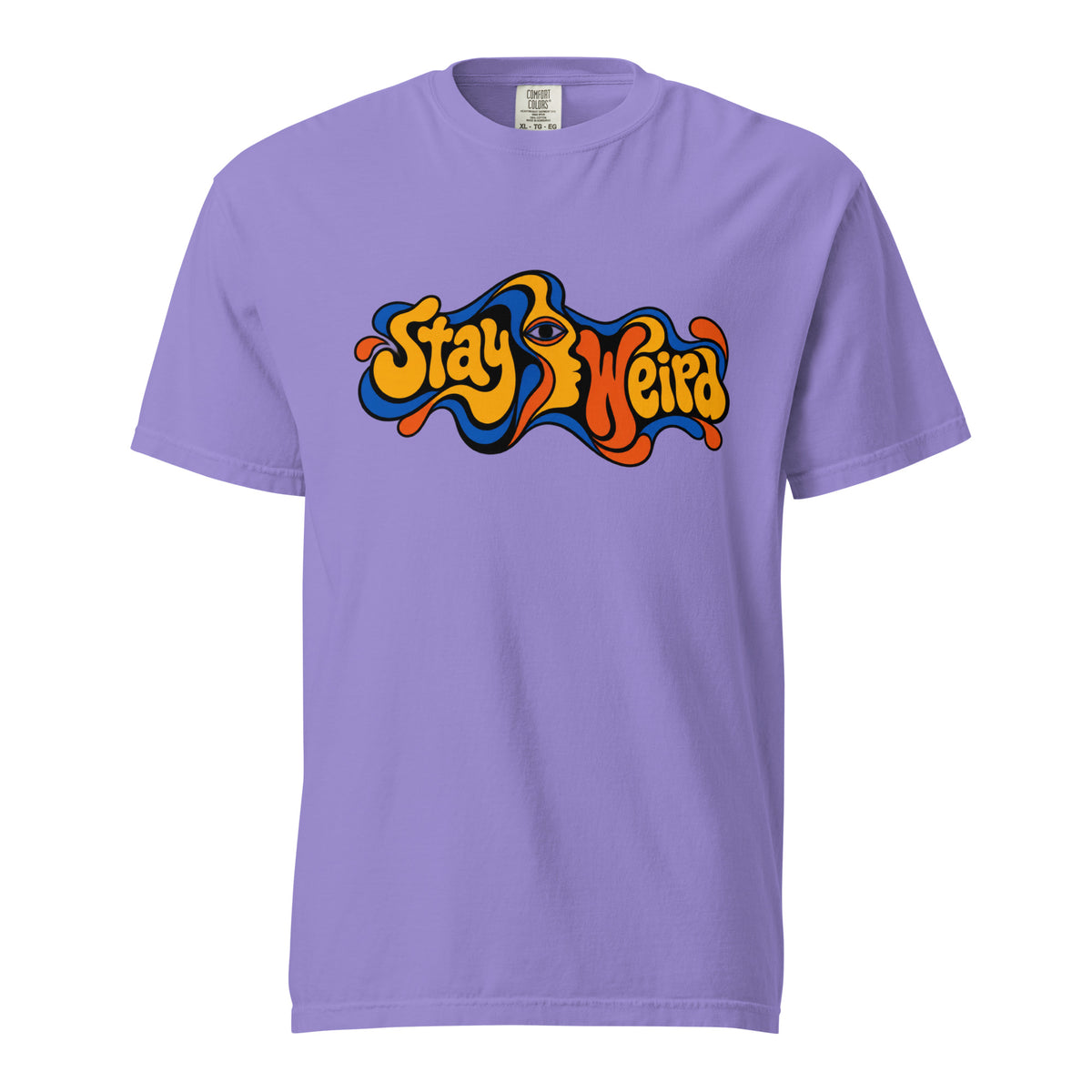 Front view of a violet T-shirt featuring a central stylised eye with colourful wavy “Stay Weird” typography and bold outlined shapes.