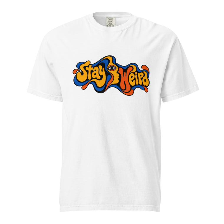 Front view of a white T-shirt with colorful wavy “Stay Weird” lettering, a central stylised eye, and bold outlined shapes.