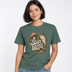 Mushroom t shirt in Blue Spruce worn by a studio model in an upper-body walking pose on a clean white background