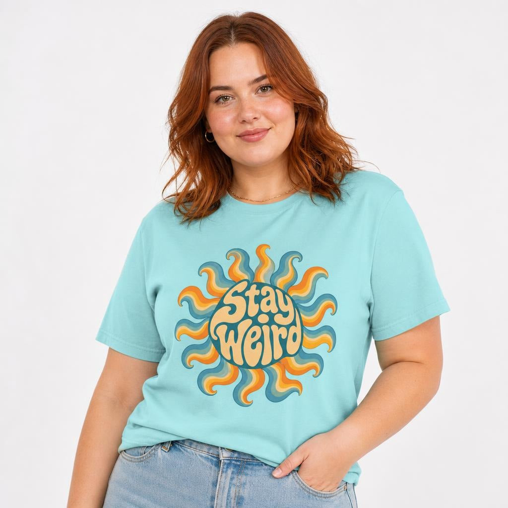 Sun t shirt in Lagoon Blue worn by a studio model in an upper-body three quarter left pose on a clean white background