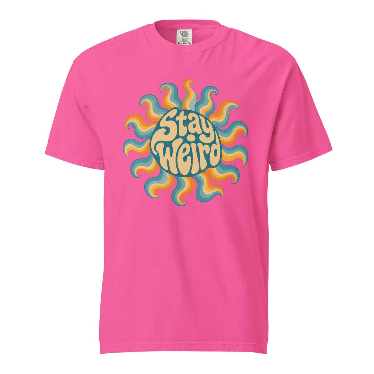 Front view of a neon pink T-shirt with a colourful retro sun graphic and readable “Stay Weird” lettering.