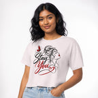 Stay You t shirt in Orchid worn by a studio model in an upper-body three quarter left pose on a clean white background