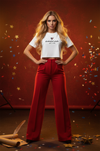 Model wearing the America Est. 1776 Crop Top with red trousers in a patriotic studio scene