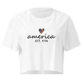 America Est. 1776 white crop top front product mockup with minimal patriotic script graphic