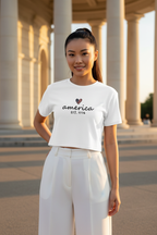 Model wearing the America Est. 1776 Crop Top with a white summer outfit