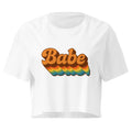 Babe Retro Rainbow white crop top front product mockup with brown script lettering and rainbow stripe graphic