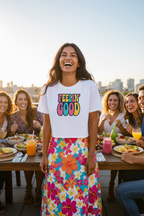 Model wearing the Feelin’ Good Colour Pop Crop Top at an outdoor festival scene with bright colour-pop styling