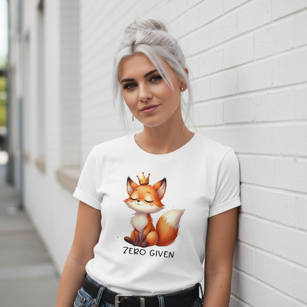 Woman wearing a white t-shirt with a fox graphic and 'ZERO GIVEN' text against a white wall.