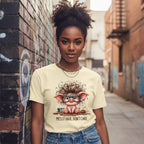 Woman wearing a t-shirt with a cartoon pig design and text in an urban alley.