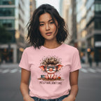 Person wearing a pink t-shirt with a cartoon pig design and text in an urban setting