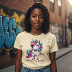 Woman wearing a t-shirt with a unicorn graphic and text, standing in an urban setting.