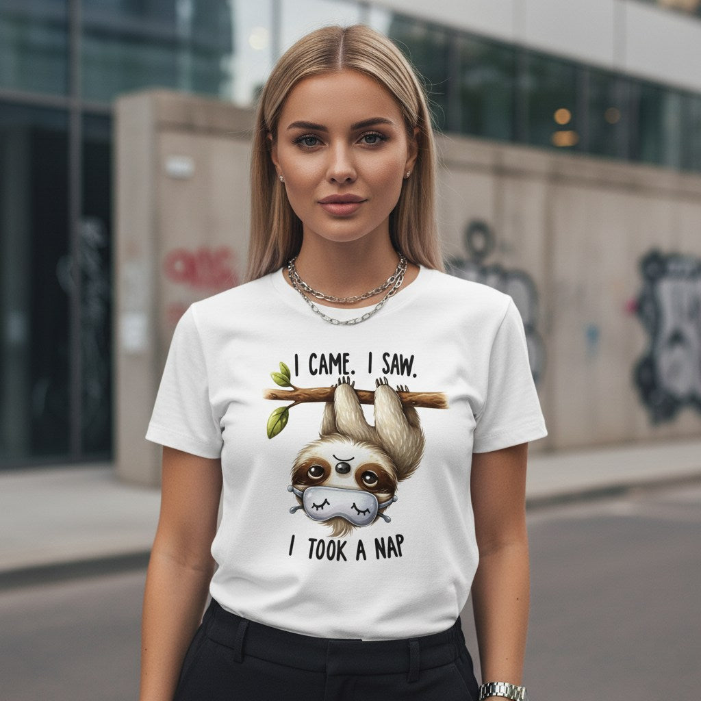 Woman wearing a white t-shirt with a sloth graphic and text on a city street.