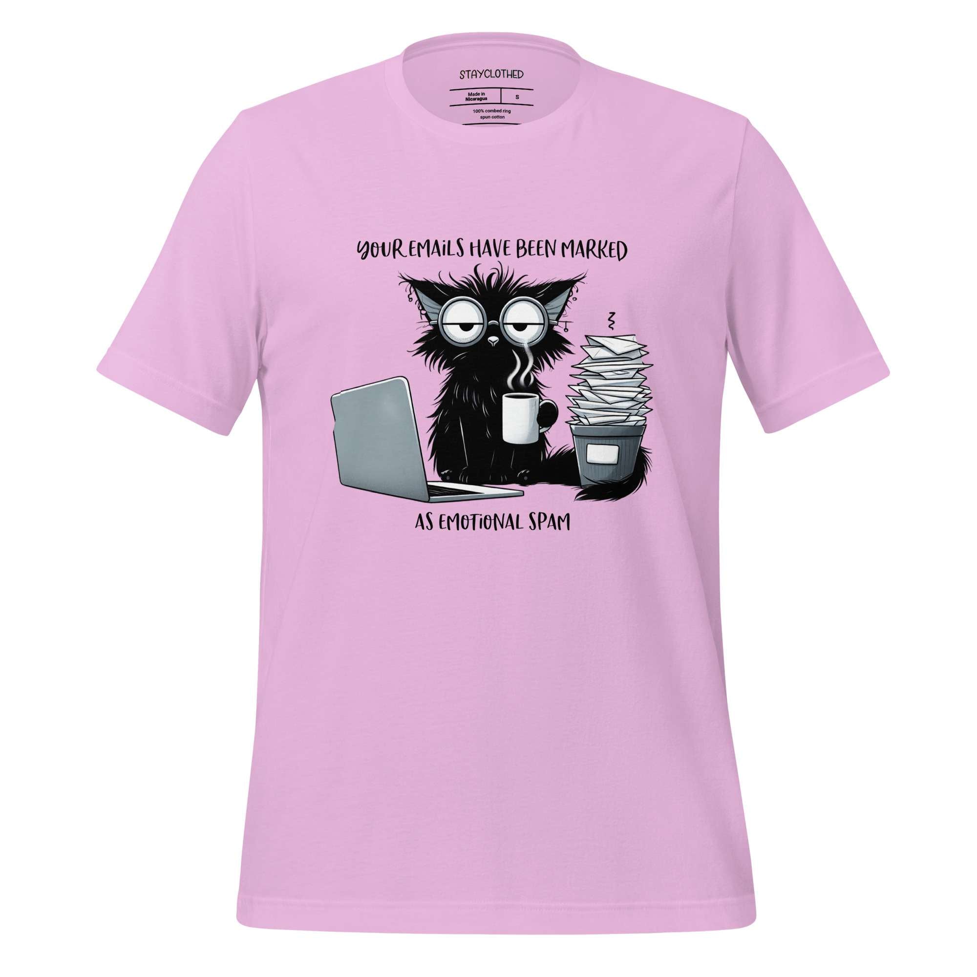 Pink t-shirt with a graphic of a cat and coffee cup on a wooden surface, featuring the brand 'StayClothed'.