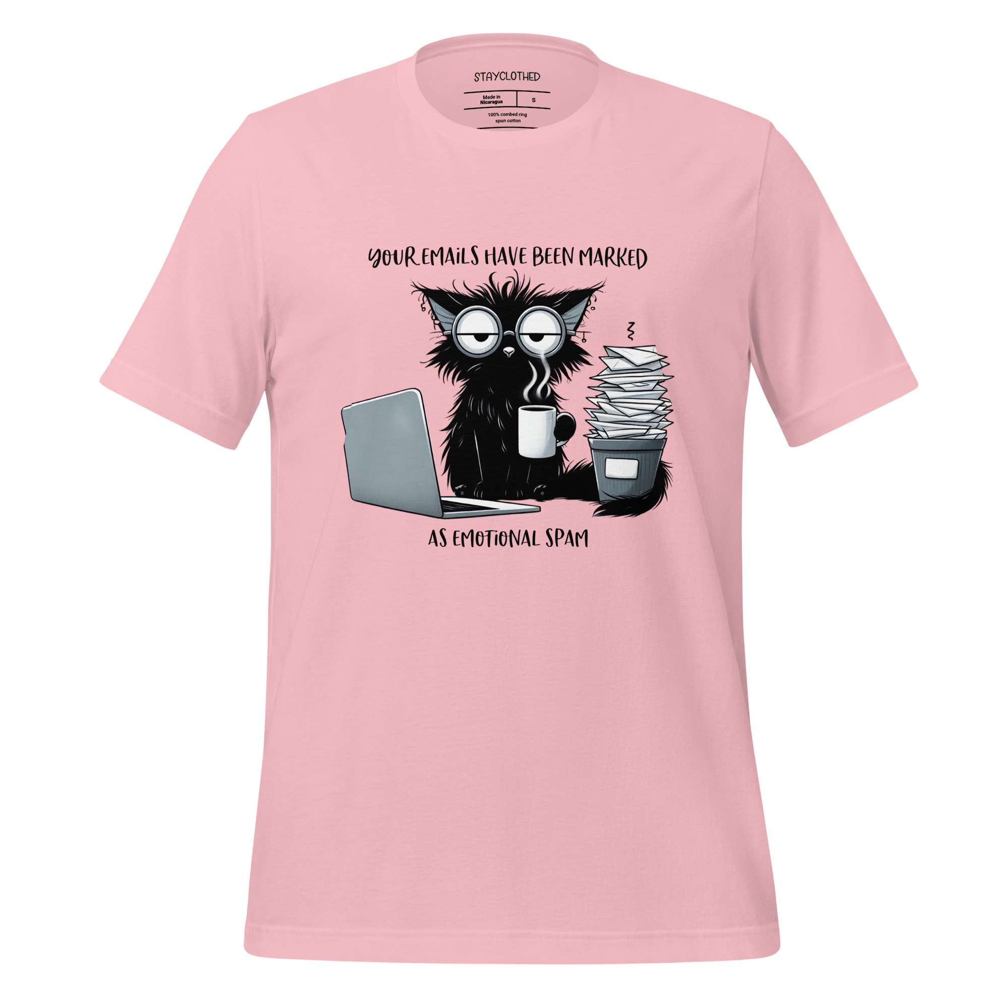 Pink t-shirt with a graphic of a cat and coffee cup on a wooden surface, featuring the brand 'StayClothed'.